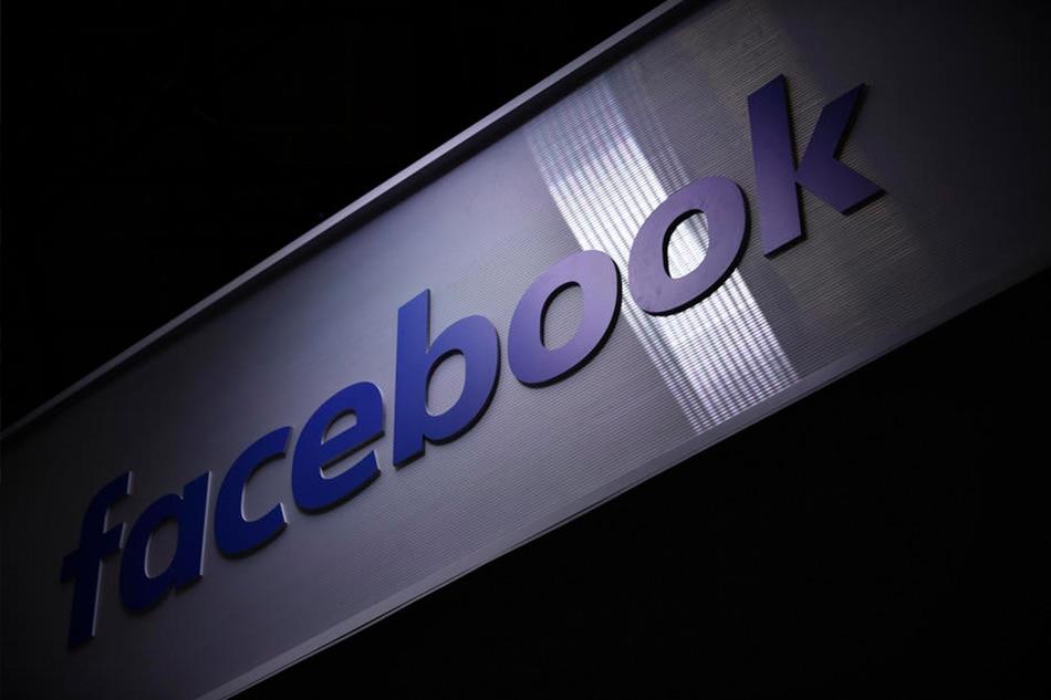 A  Facebook  logo  on  a  stand  during  the  Vivatech  startups  and  innovation  fair, in  Paris, May  16, 2019. Julien  de  Rosa, EPA-EFE/file